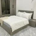 Giường ngủ màu xám xi măng 1